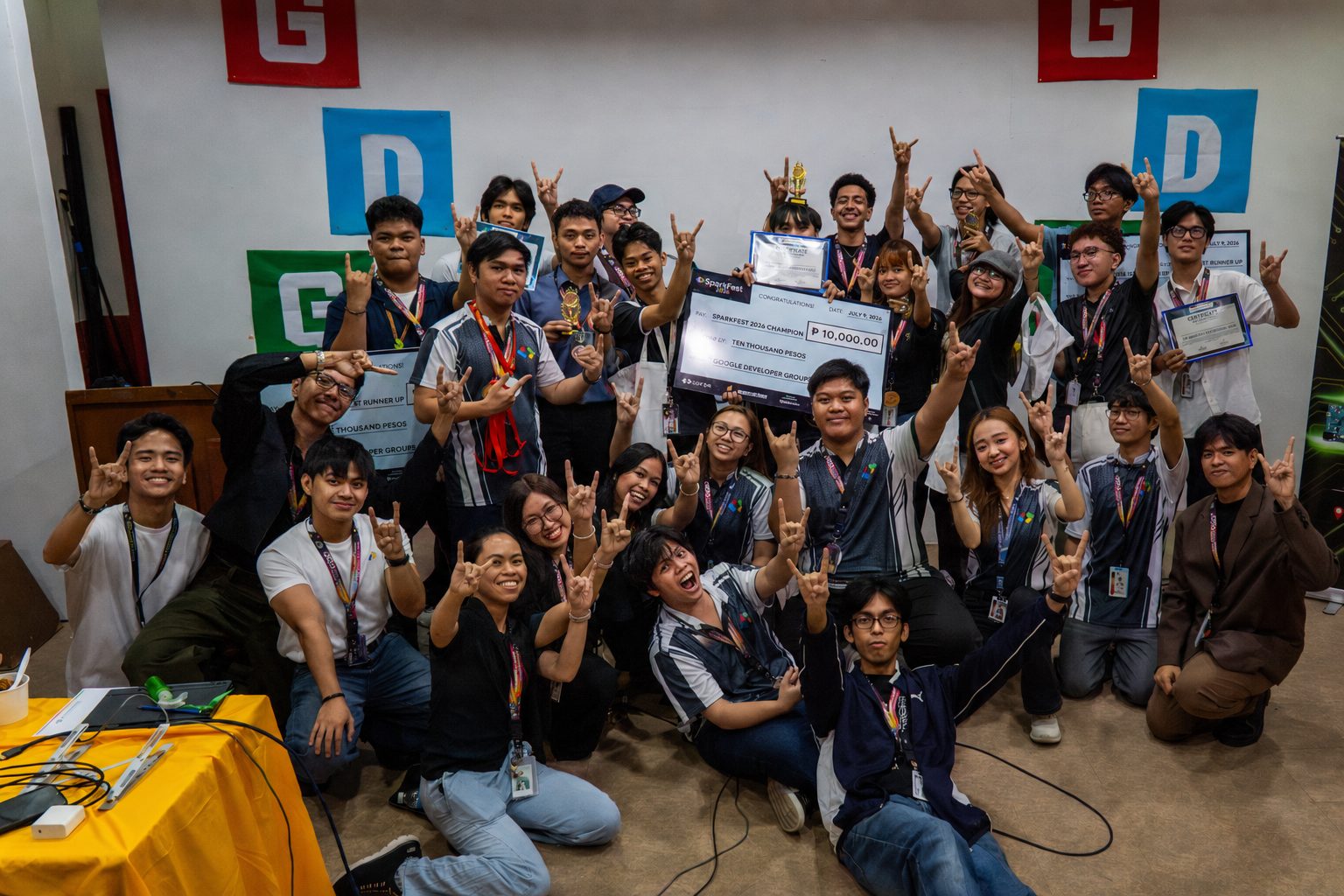 SparkFest 2026 winners and organizers in a group photo with prize checks