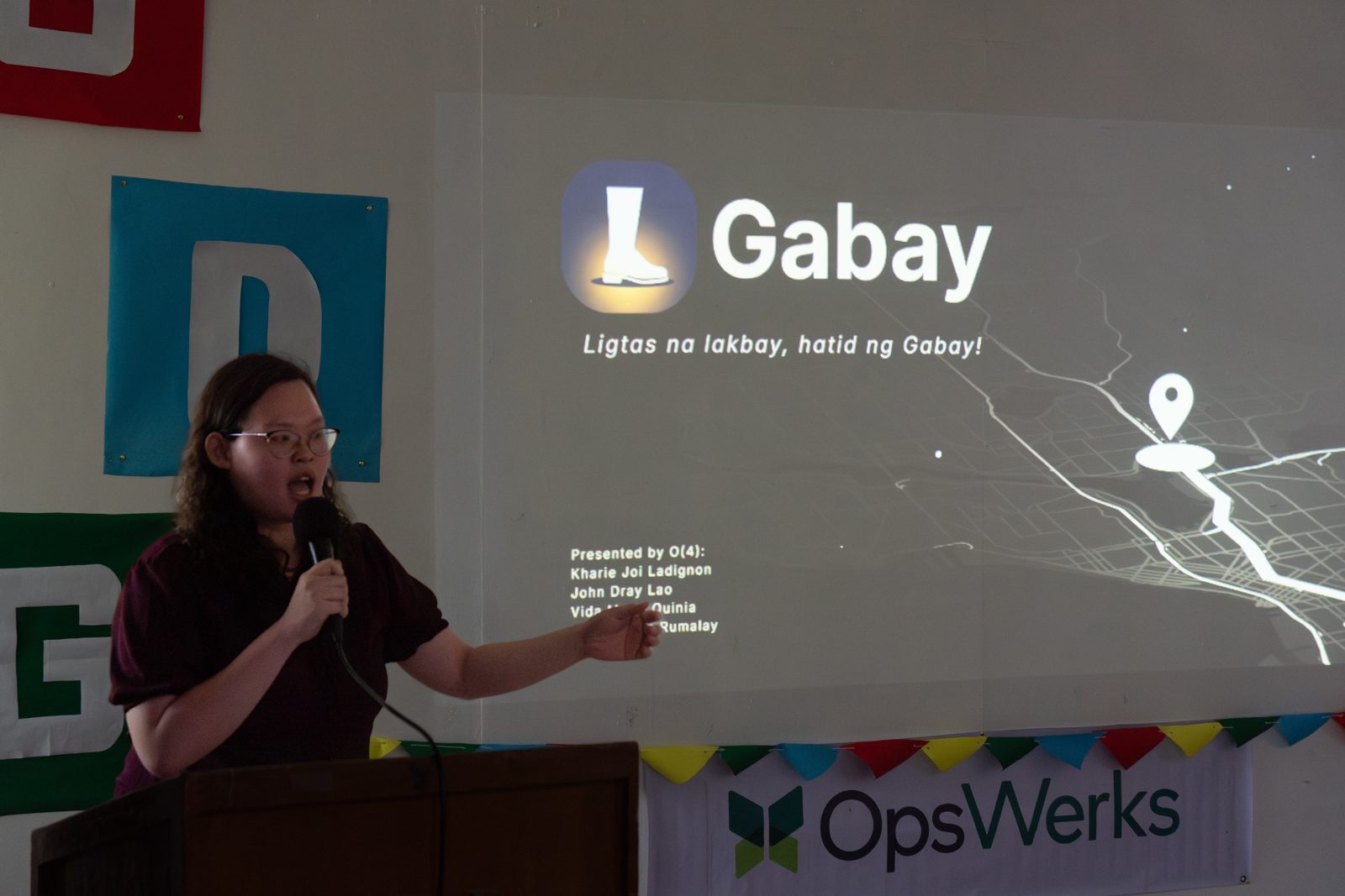 Team O(4) presenting Gabay, a safe-travel app, at SparkFest 2026