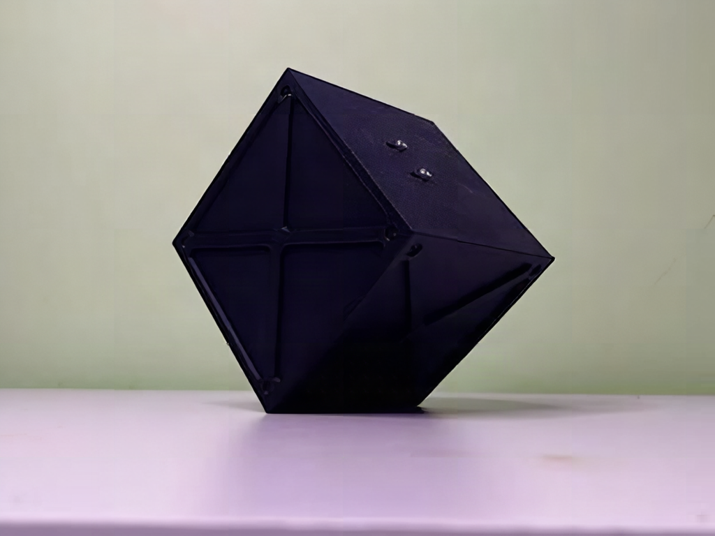This ESP32 Reaction Wheel Cube Lands and Balances on One Edge