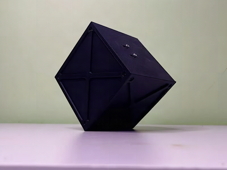 This ESP32 Reaction Wheel Cube Lands and Balances on One Edge